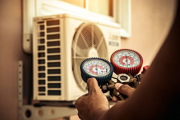 Professional Hvac technician working in Holliston, MA